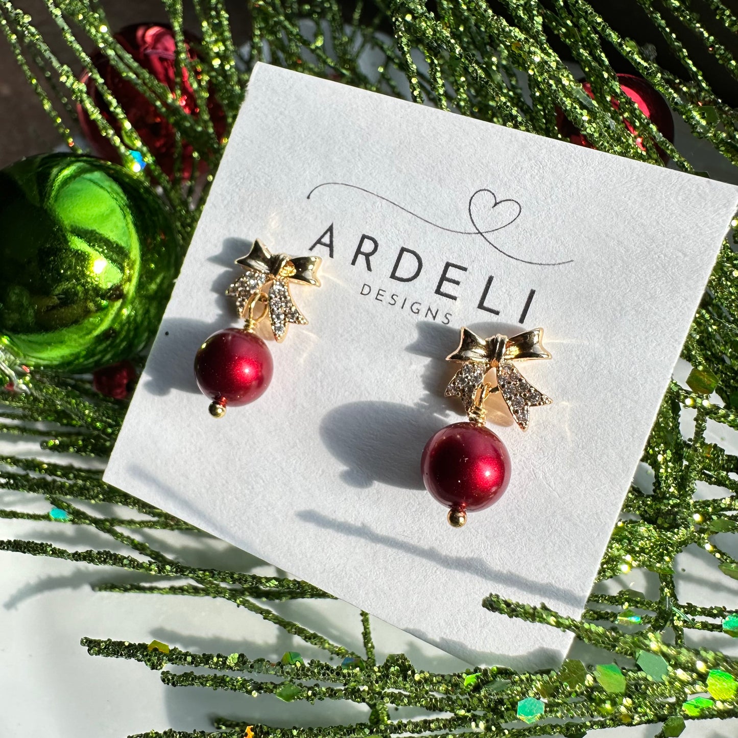 Holiday Cheer Gold Plated Bow Post with Red Pearl Dangle Earrings